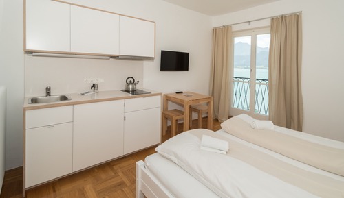 Suite estudio de diseño, vistas al lago, junto al lago