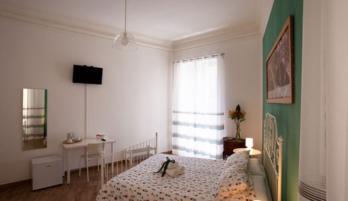 Habitación doble superior, varias camas, balcón