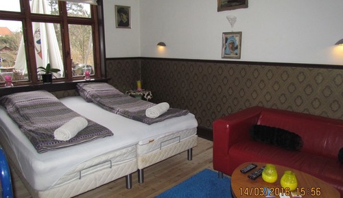 Habitación triple, vistas al jardín