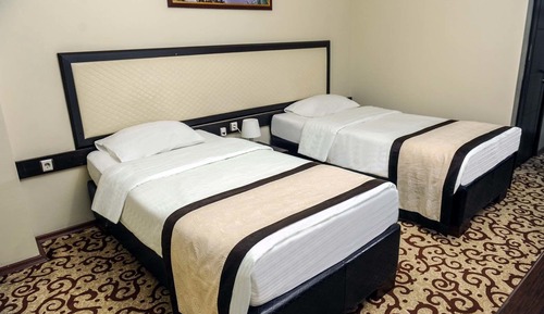 Habitación estándar con 1 cama doble o 2 individuales