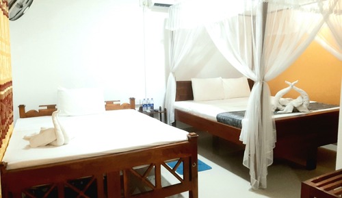 Habitación triple Deluxe