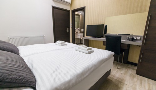Habitación estándar con 1 cama doble o 2 individuales