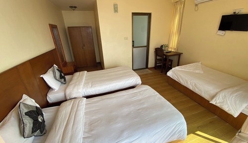 Habitación triple Deluxe