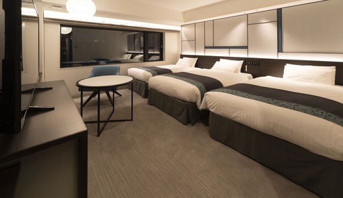Habitación triple Deluxe (2 Single Beds and 1 Extra Bed)