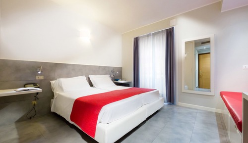 Habitación Confort con 1 cama doble o 2 individuales