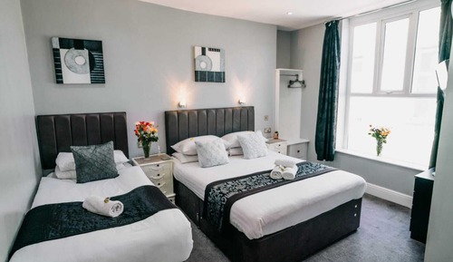 Habitación triple estándar, varias camas