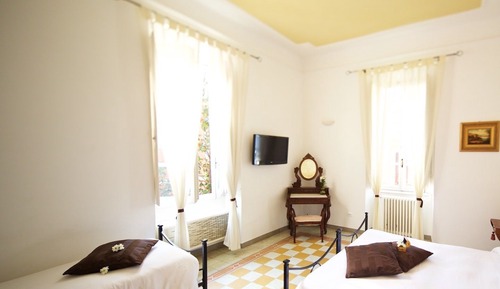 Habitación triple Deluxe, vistas al jardín