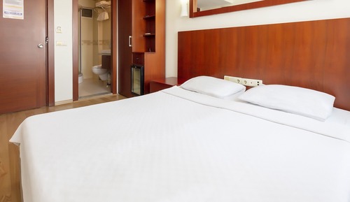 Habitación estándar con 1 cama doble o 2 individuales