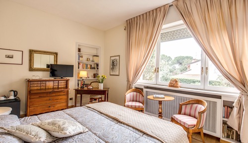 Suite junior, baño privado, vistas al parque
