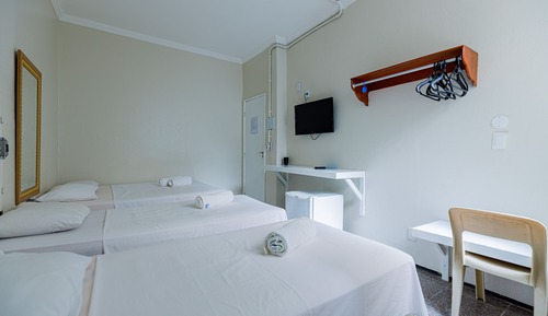 Habitación cuádruple, varias camas