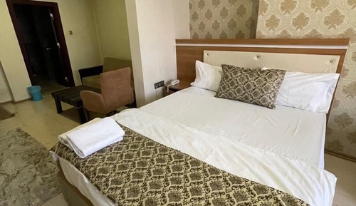 Habitación estándar con 1 cama doble o 2 individuales