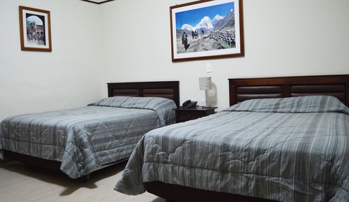 Habitación con 2 camas individuales