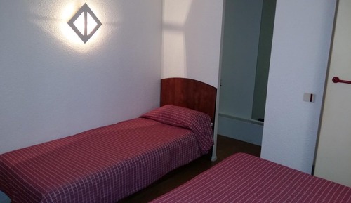 Habitación con 2 camas individuales