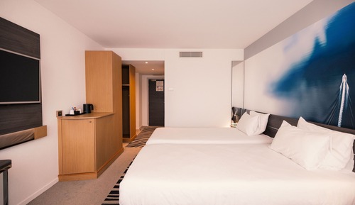 Habitación clásica con 2 camas individuales, varias camas