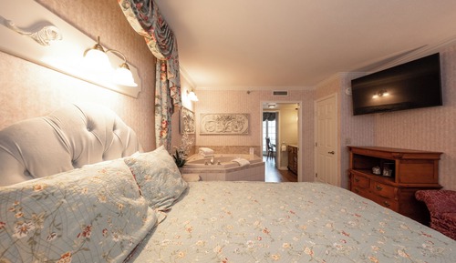 Suite Deluxe, 1 cama de matrimonio grande con sofá cama, vistas parciales al mar