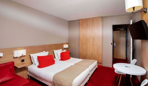 Habitación triple, varias camas