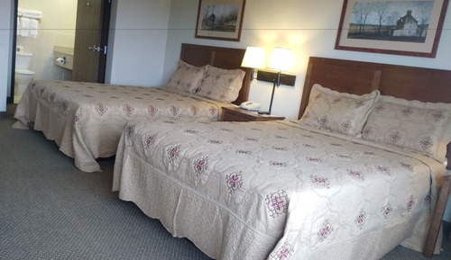 Habitación ejecutiva, varias camas