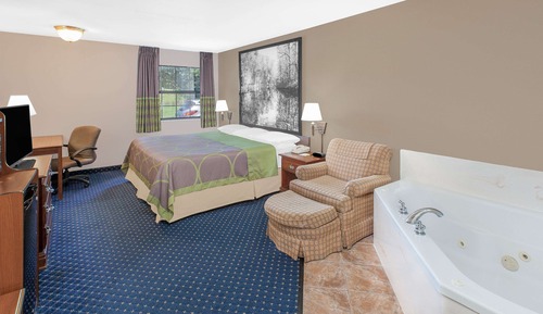 Suite estándar, 1 cama de matrimonio grande, bañera de hidromasaje