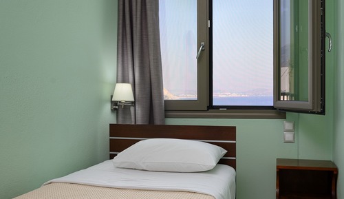 Habitación triple, vistas al mar