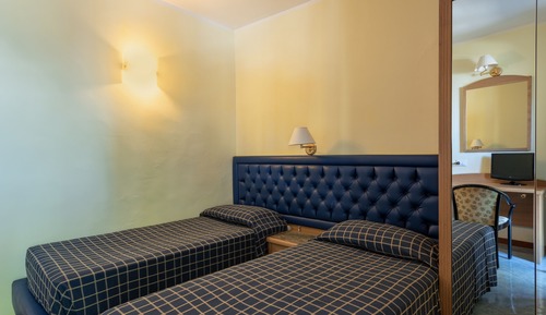 Habitación estándar con 1 cama doble o 2 individuales