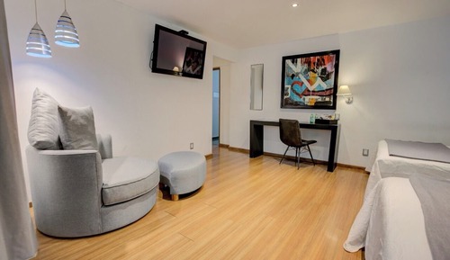 Habitación superior con 2 camas individuales, terraza