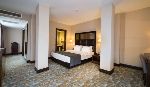 Suite, 1 cama doble, en esquina