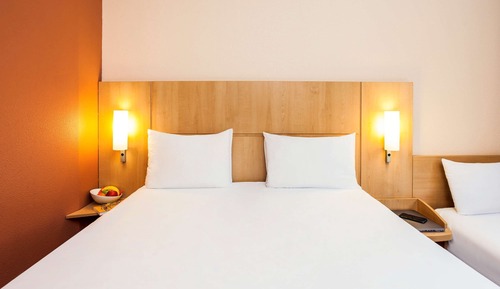 Habitación, varias camas