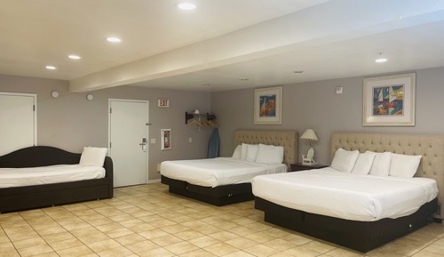 Habitación superior, varias camas