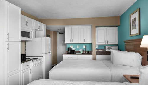 Habitación estándar, 2 camas de matrimonio, vistas parciales al mar