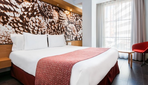 Habitación estándar con 1 cama doble o 2 individuales