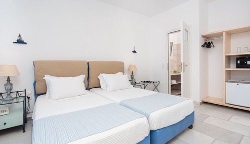 Habitación triple, vistas al mar