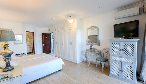 Suite familiar, vistas parciales al mar