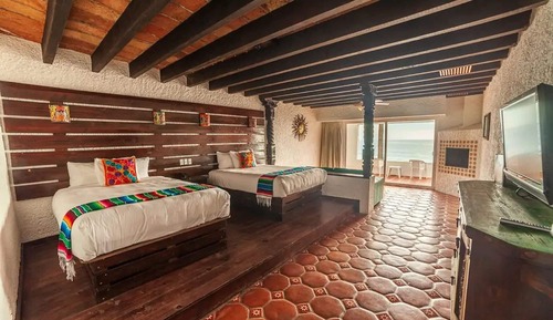 Suite junior, 2 camas de matrimonio, vistas al mar