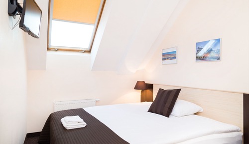 Habitación estándar con 1 cama doble o 2 individuales