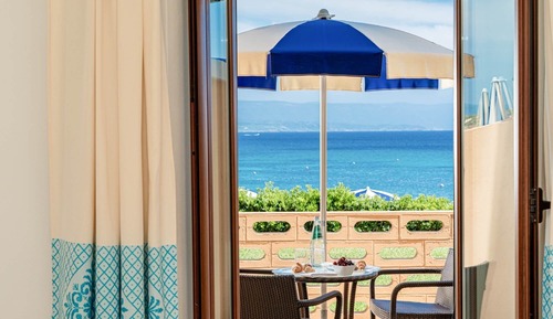 Habitación Deluxe, varias camas, vistas al mar, frente a la playa