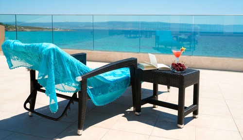 Habitación triple, vistas al mar