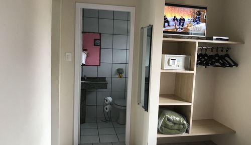 Habitación triple, frigorífico y microondas (Piso Superior)