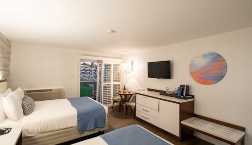 Habitación individual, 2 camas de matrimonio, vistas parciales al mar
