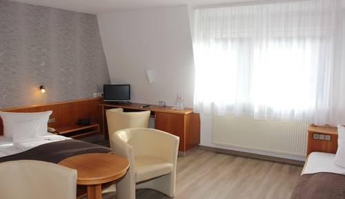 Habitación triple Confort, varias camas