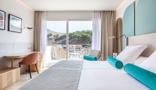 Suite junior, balcón, vistas al mar (2 adults + 2 children)