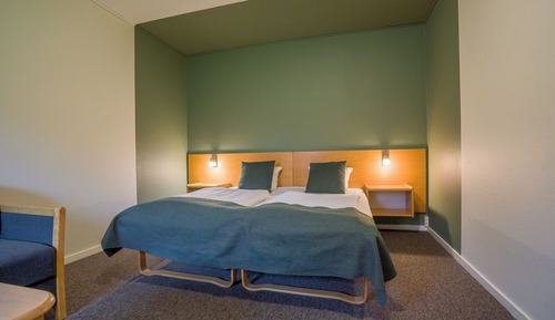 Habitación cuádruple Confort, 1 cama de matrimonio grande con sofá cama