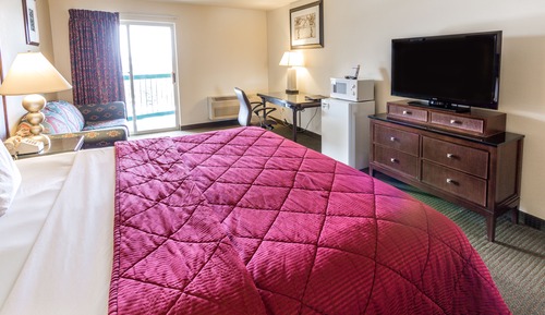 Habitación Signature, 1 cama de matrimonio grande con sofá cama, balcón ( Not Pet Friendly)