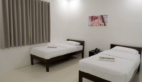 Habitación con 2 camas individuales