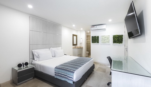 Habitación triple, varias camas