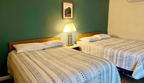 Habitación doble superior, varias camas, frigorífico y microondas