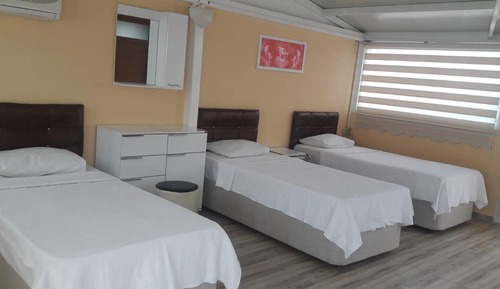 Habitación triple Deluxe
