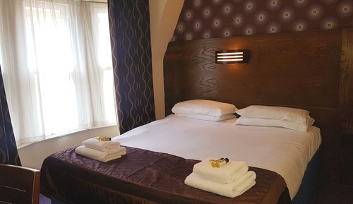Habitación estándar con 1 cama doble o 2 individuales