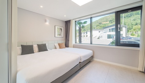 Habitación con 2 camas individuales, vistas al mar