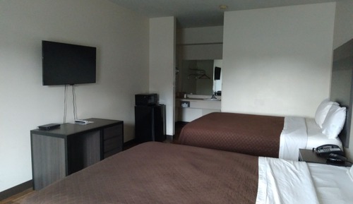 Habitación estándar, 2 camas de matrimonio, fumadores, frigorífico y microondas