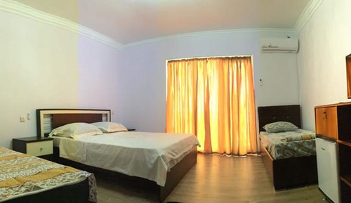 Habitación triple de lujo